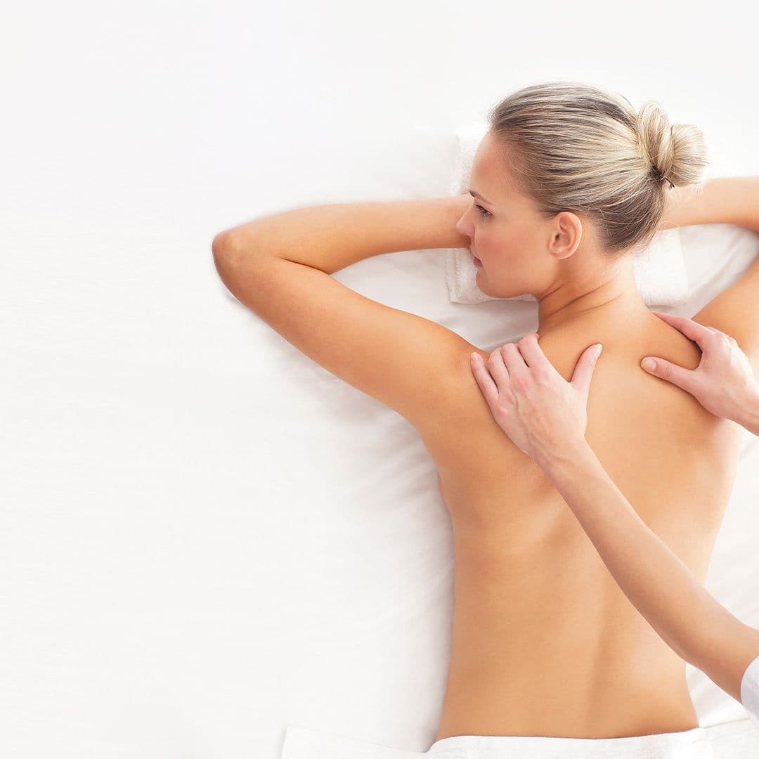 Massage room — quiet, neutral palette